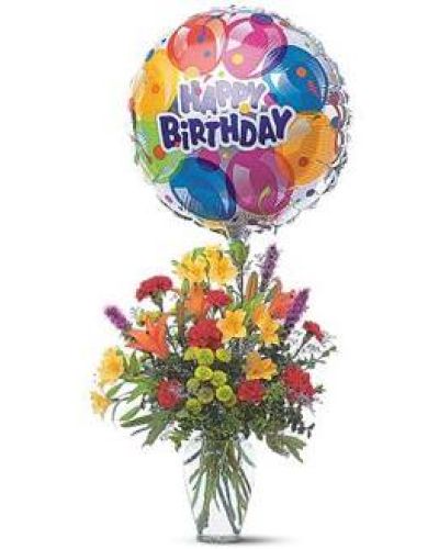 Take their birthday to brand new heights with this colorful arrangement of flowers and a high-flying birthday balloon.
Alstroemeria, carnations, chrysanthemums and lilies are delivered in a clear glass vase with attached foil balloon.