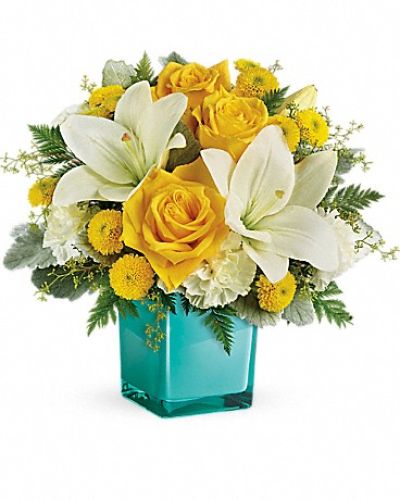 <div class="m-pdp-tabs-description">
<div id="mark-1" class="m-pdp-tabs-marketing-description">

Inspired by the sunny sound of children's laughter, this lighthearted bouquet of golden roses and fragrant white lilies is presented in a stunning cube vase. What a stylish way to make someone smile!

</div>
</div>
This cheerful bouquet features yellow roses, white asiatic lilies, white carnations, yellow button spray chrysanthemums, seeded eucalyptus, dusty miller and leatherleaf fern. Delivered in a glass cube.