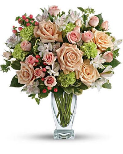 <div class="m-pdp-tabs-description">
<div id="mark-1" class="m-pdp-tabs-marketing-description">You'd do anything for them, so let them know how you feel by sending this generous and gorgeous arrangement. Who could ask for anything more?</div>
</div>
<p id="arrngDescp">Beautiful peach roses and spray roses, white alstroemeria, brilliant green carnations, peach hypericum and fresh garden greens are perfectly hand-arranged in a feminine Couture Vase.</p>