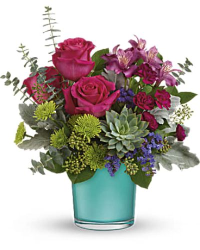 <div id="mark-3" class="m-pdp-tabs-marketing-description">
<div id="mark-3" class="m-pdp-tabs-marketing-description">
<div id="mark-3" class="m-pdp-tabs-marketing-description">
<div id="mark-3" class="m-pdp-tabs-marketing-description">A wonderland of color! This vibrant mix of dark pink roses with pops of green and purple looks especially wondrous in this shimmering blue topaz-colored vase! A glorious gift for any occasion.</div>
<p>&nbsp;</p>
<div id="desc-3">
<p>This wondrous arrangement features dark pink roses, dark pink alstroemeria, miniature purple carnations, green button spray chrysanthemums, blue sinuata statice, dusty miller, spiral eucalyptus, seeded eucalyptus, lemon leaf, and a large green echeveria succulent plant.
</p></div>
</div>
</div>
</div>
