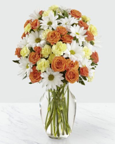 <p>The Sweet Splendor Bouquet has a citrus sweet vibe that is set to help you celebrate your special recipient! White traditional daisies provide a perfectly beautiful background for the bold colors of the orange spray roses and yellow mini carnations to pop, making this an unforgettable fresh flower arrangement.</p>