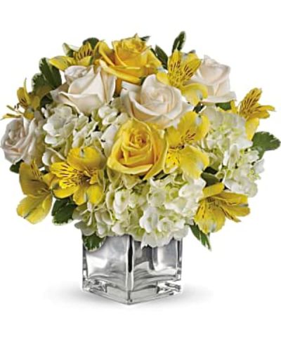 <div id="mark-3" class="m-pdp-tabs-marketing-description">Even if she's already in a great mood, this cheerfully charming bouquet will boost her spirits to the sky. Yellow roses, crème roses and other favorites in a sleek silver cube vase - irresistible!</div>
<div id="desc-3">
<ul>
<li>The bright bouquet includes white hydrangea, light yellow roses, crème roses and yellow alstroemeria accented with fresh greenery.</li>
<li>Delivered in a contemporary glass cube with a mirrored silver finish.</li>
</ul>
</div>