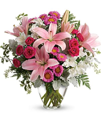 <div id="mark-2" class="m-pdp-tabs-marketing-description">Sure to make them blush! Spoil them on a special day, or just because, with this luxurious lily arrangement in gorgeous shades of blush pink.</div>
<div id="desc-2">
<ul>
<li>This pretty bouquet features hot pink spray roses, pink asiatic lilies, white alstroemeria, pink matsumoto asters, seeded eucalyptus, leatherleaf fern, dusty miller, and pitta negra.</li>
<li>Delivered in a Serenity Vase.</li>
</ul>
</div>