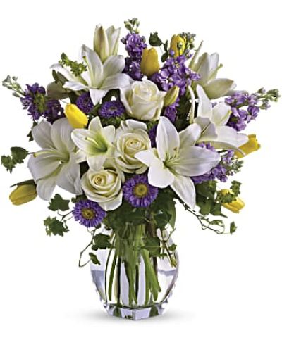 <div id="mark-3" class="m-pdp-tabs-marketing-description">Dance into spring! Send this bouquet of favorite spring flowers to brighten someone's day with the playful beauty of nature. Such a pretty way to say, "I'm thinking of you!"</div>
<p>&nbsp;</p>
<div id="desc-3">
<ul>
<li>This white, lavender and yellow bouquet includes white asiatic lilies, cream roses, yellow tulips, lavender stock, lavender matsumoto asters and greens including bupleurum, ivy and seeded eucalyptus.</li>
</ul>
</div>