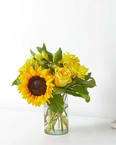 Feel like someone's cheering you on with bright sunflowers, roses, and alstroemeria.